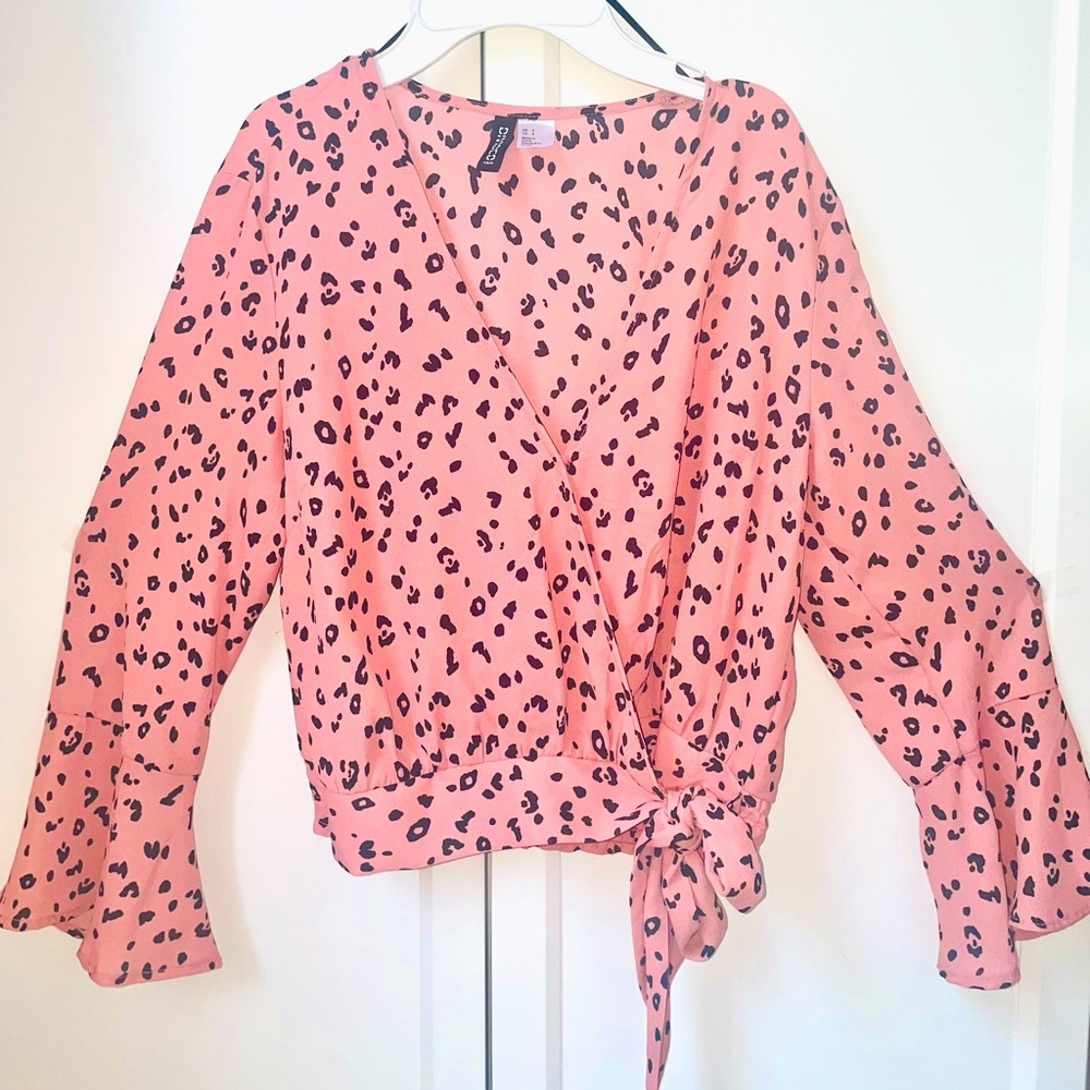 H&M pink cheeta wrap blouse with hand frills. Size: US 4 Small